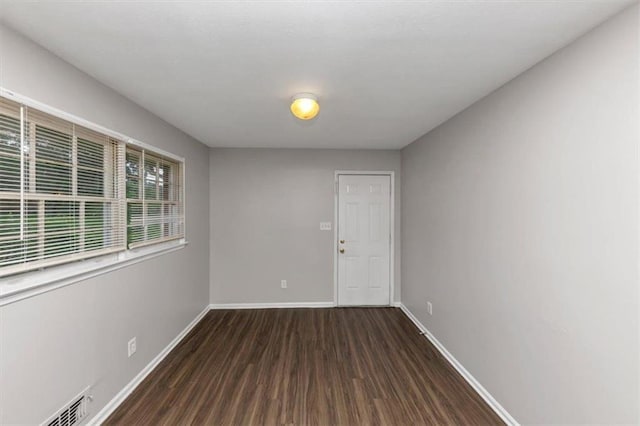 1338 Georgia Ave, Atlanta, GA 30344 - empty room with wood finished floors and baseboards