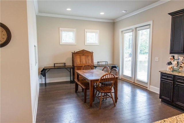6390 Yellow Birch St, Cumming, GA 30040 - dining room with dark wood finished floors, crown molding, baseboards, and recessed lighting