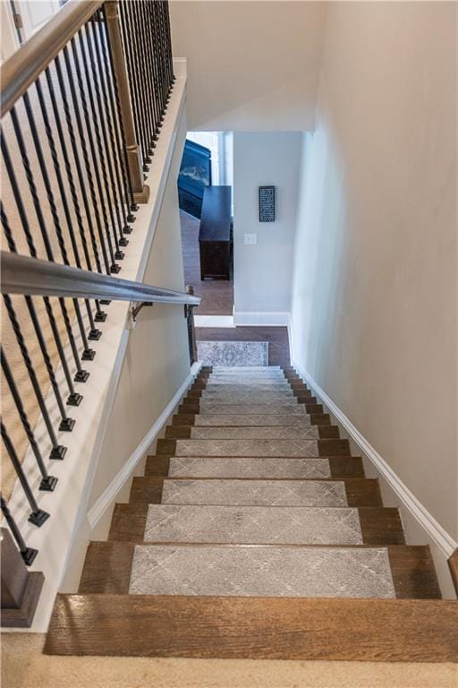 6390 Yellow Birch St, Cumming, GA 30040 - staircase with baseboards