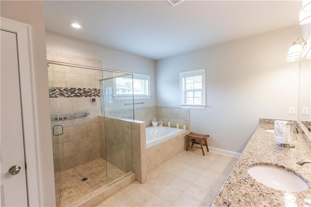 6390 Yellow Birch St, Cumming, GA 30040 - bathroom with a garden tub, a stall shower, double vanity, tile patterned flooring, and baseboards
