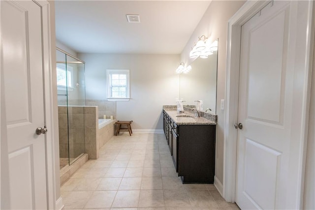 6390 Yellow Birch St, Cumming, GA 30040 - bathroom featuring vanity, a bath, tile patterned floors, baseboards, and a tile shower