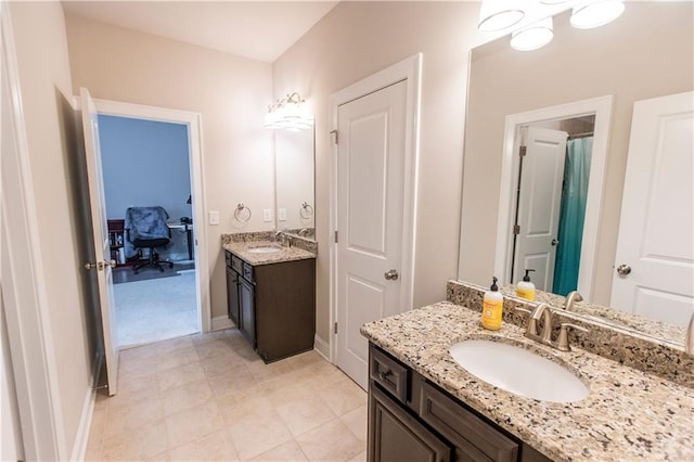 6390 Yellow Birch St, Cumming, GA 30040 - full bathroom with vanity, baseboards, and tile patterned flooring