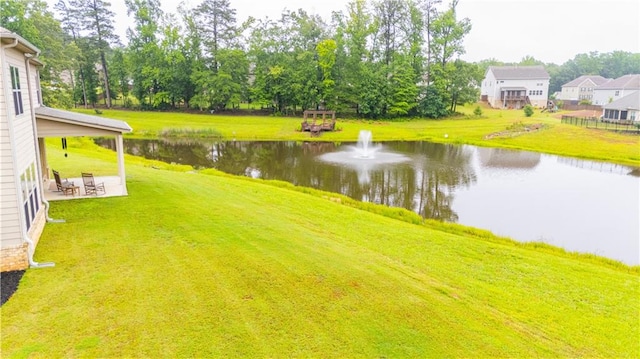 6390 Yellow Birch St, Cumming, GA 30040 - view of grassy yard with a water view and a patio area