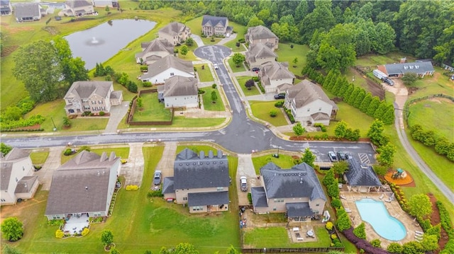 6390 Yellow Birch St, Cumming, GA 30040 - aerial view of property and surrounding area featuring nearby suburban area, a large body of water, and a pool area