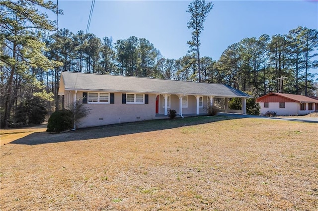 ranch-style house featuring a front lawn