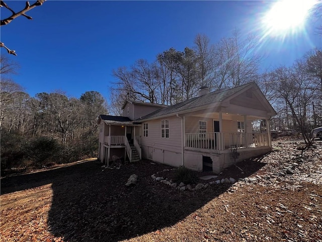 view of home's exterior featuring a porch