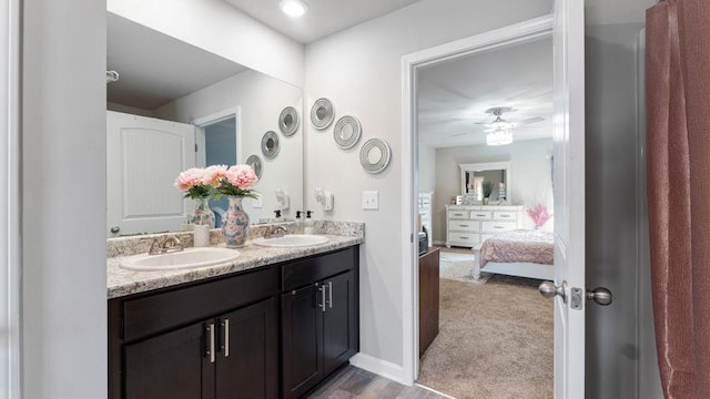 bathroom with vanity and ceiling fan