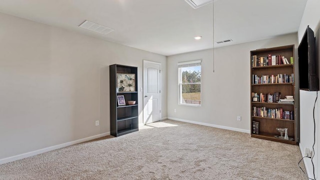 interior space featuring light colored carpet