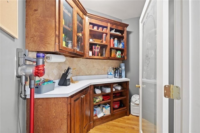19 Spring Lake Trl NE, White, GA 30184 - bar with decorative backsplash and light wood-type flooring