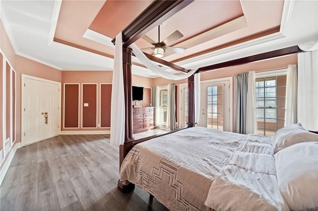 19 Spring Lake Trl NE, White, GA 30184 - bedroom featuring a raised ceiling, wood finished floors, crown molding, access to exterior, and ceiling fan