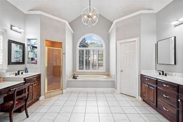 19 Spring Lake Trl NE, White, GA 30184 - full bathroom with a stall shower, a bath, two vanities, lofted ceiling, and a chandelier