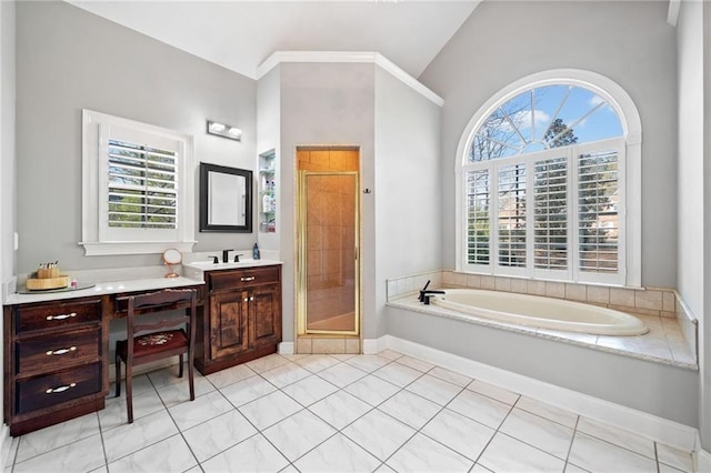 19 Spring Lake Trl NE, White, GA 30184 - bathroom featuring vanity, a garden tub, a shower stall, plenty of natural light, and vaulted ceiling