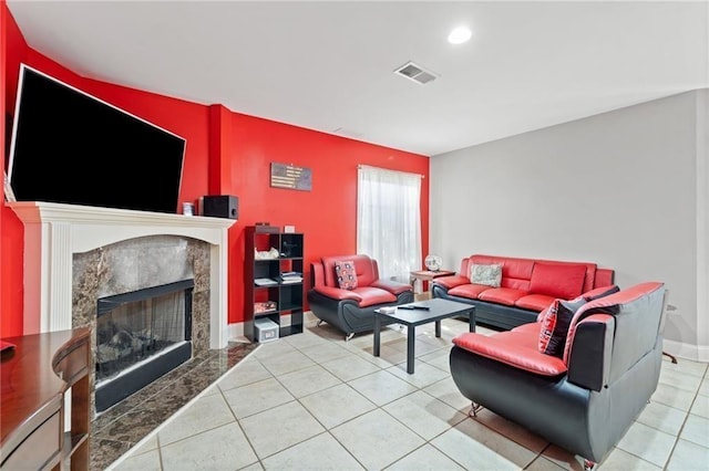 19 Spring Lake Trl NE, White, GA 30184 - living room with a high end fireplace, tile patterned flooring, and recessed lighting
