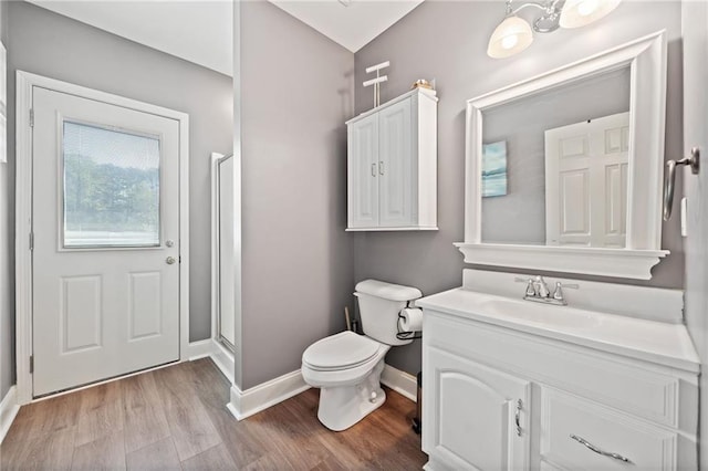 19 Spring Lake Trl NE, White, GA 30184 - full bath featuring baseboards, vanity, toilet, wood finished floors, and a shower stall