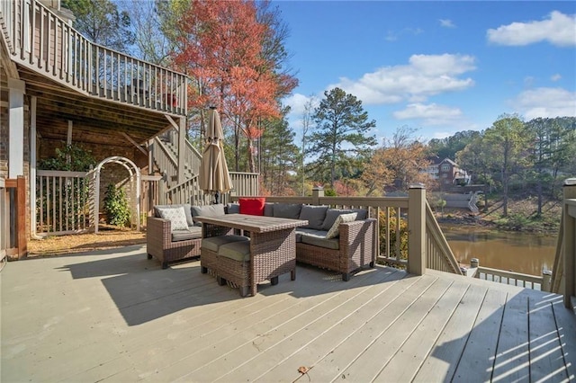 19 Spring Lake Trl NE, White, GA 30184 - wooden terrace featuring an outdoor living space, stairway, and a water view