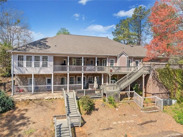 19 Spring Lake Trl NE, White, GA 30184 - back of house with stairs, brick siding, and central AC unit