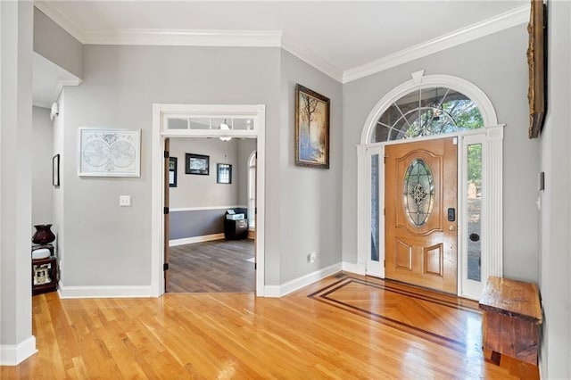 19 Spring Lake Trl NE, White, GA 30184 - entryway with wood finished floors, baseboards, ornamental molding, and arched walkways