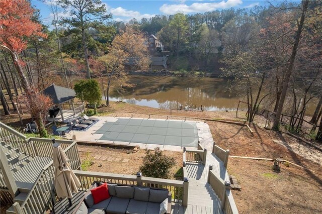 19 Spring Lake Trl NE, White, GA 30184 - exterior space with a water view, stairs, a covered pool, and a patio area
