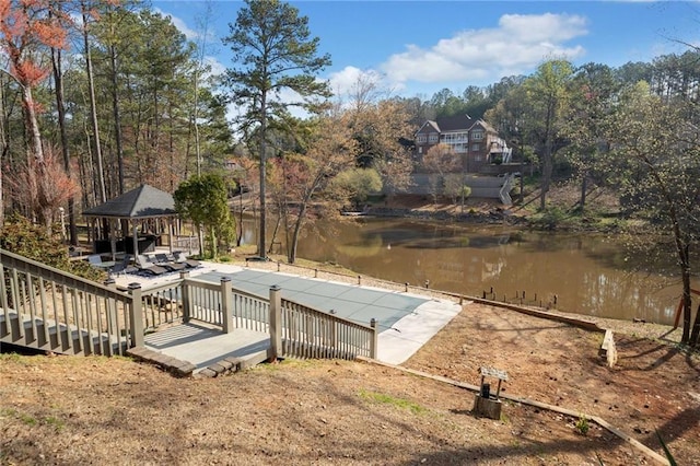 19 Spring Lake Trl NE, White, GA 30184 - dock area with a gazebo, view of scattered trees, and a deck with water view
