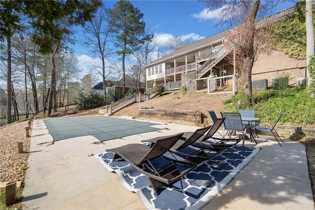 19 Spring Lake Trl NE, White, GA 30184 - view of swimming pool with stairs and a patio area