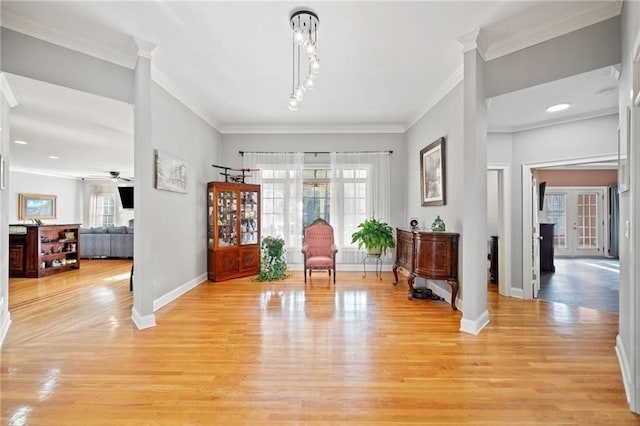19 Spring Lake Trl NE, White, GA 30184 - entrance foyer with baseboards, light wood-style flooring, crown molding, and a ceiling fan