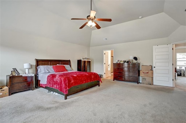 bedroom featuring vaulted ceiling, carpet floors, and ceiling fan