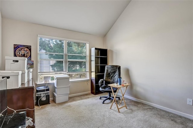 living area featuring lofted ceiling, carpet, and baseboards