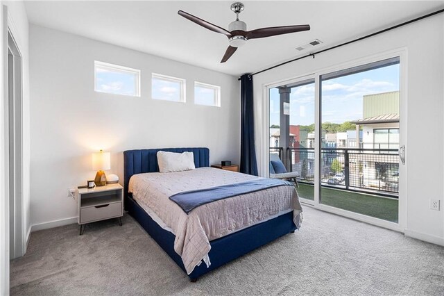 395 Pratt Dr SE Unit No 802, Atlanta, GA 30315 - carpeted bedroom featuring access to exterior, baseboards, and a ceiling fan