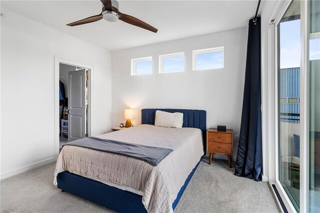 395 Pratt Dr SE Unit No 802, Atlanta, GA 30315 - bedroom featuring light carpet, a ceiling fan, and baseboards