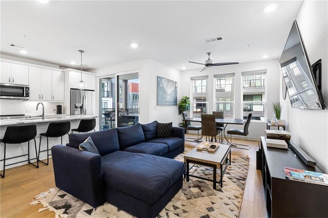 395 Pratt Dr SE Unit No 802, Atlanta, GA 30315 - living area featuring light wood-style flooring, recessed lighting, and ceiling fan