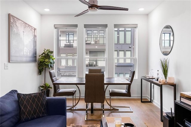 395 Pratt Dr SE Unit No 802, Atlanta, GA 30315 - dining space with ceiling fan, wood finished floors, healthy amount of natural light, recessed lighting, and baseboards