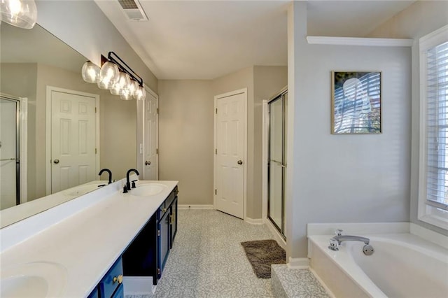 full bath with a bath, a stall shower, visible vents, and a sink