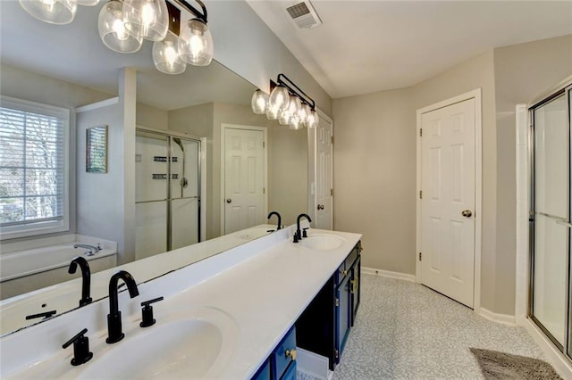 full bathroom with visible vents, a sink, and a shower stall