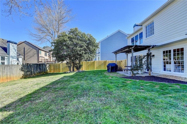 view of yard featuring a fenced backyard and a patio