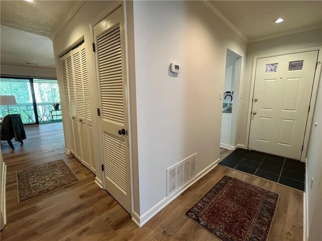 details with crown molding, a fireplace, and wood-type flooring