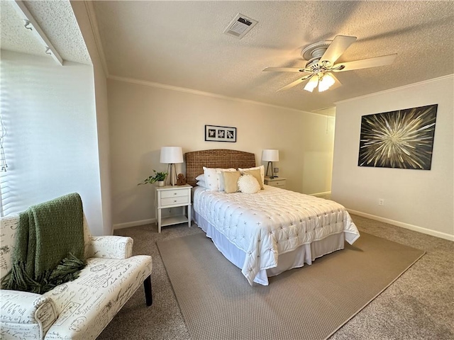 carpeted bedroom featuring a ceiling fan, visible vents, and a textured ceiling