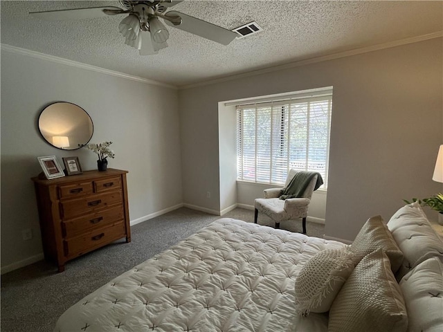 carpeted bedroom with a textured ceiling, ornamental molding, visible vents, and baseboards