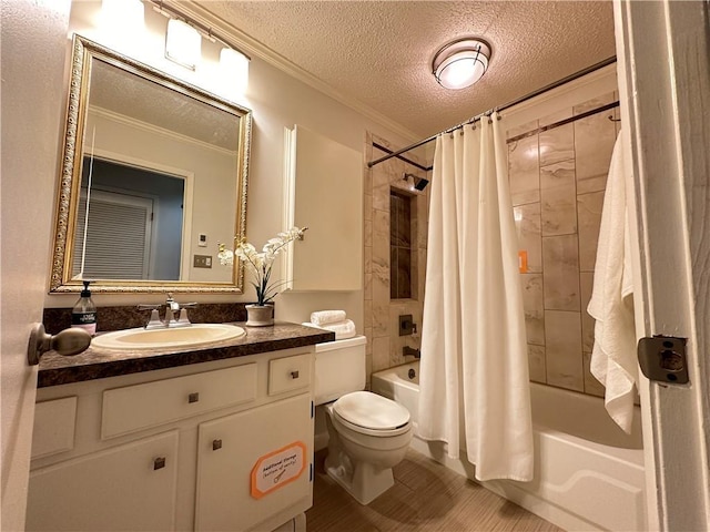 bathroom featuring shower / tub combo with curtain, toilet, ornamental molding, a textured ceiling, and vanity