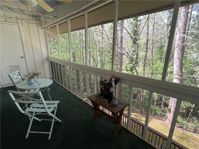 sunroom / solarium with plenty of natural light