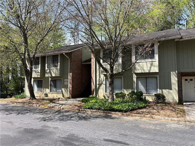 multi unit property featuring brick siding