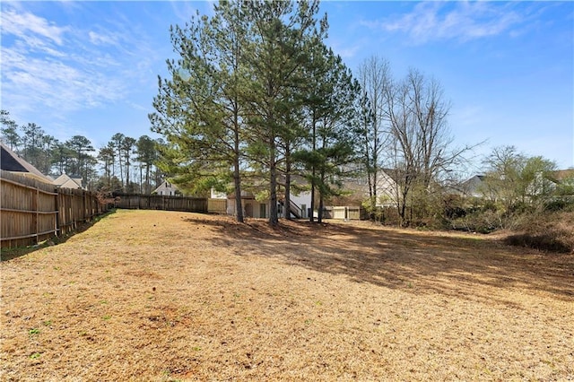 view of yard with fence