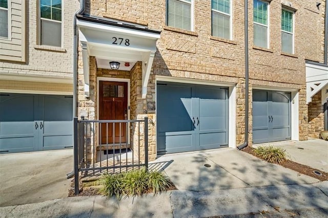 property entrance featuring a garage