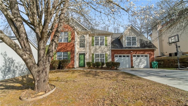 view of front of house featuring driveway, a garage, and brick siding