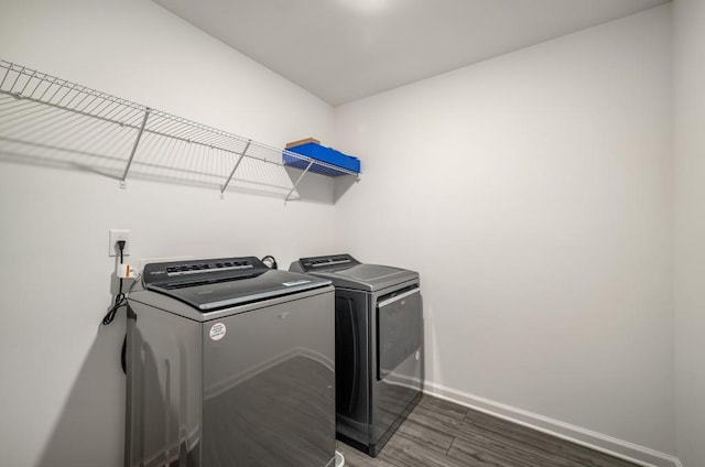 947 Edwin Ln, Sugar Hill, GA 30518 - laundry area with washer and clothes dryer and dark wood-type flooring