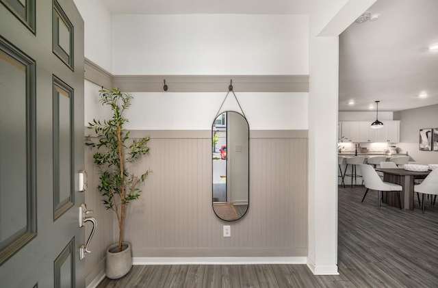 947 Edwin Ln, Sugar Hill, GA 30518 - foyer with dark wood-style flooring and wainscoting