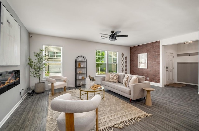 947 Edwin Ln, Sugar Hill, GA 30518 - living area featuring a ceiling fan, plenty of natural light, and wood finished floors