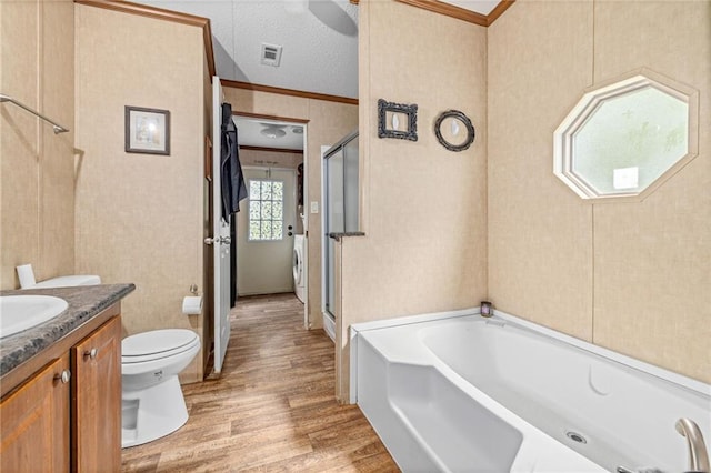 2860 Jack Bryant Cir, Gainesville, GA 30507 - full bath featuring ornamental molding, wood finished floors, a garden tub, a stall shower, and toilet
