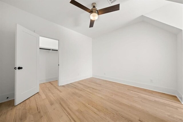 unfurnished bedroom featuring a closet, ceiling fan, and light hardwood / wood-style flooring