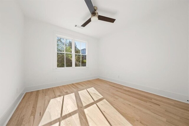 unfurnished room featuring wood-type flooring and ceiling fan