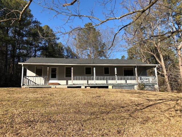 view of front of property with a front lawn and covered porch